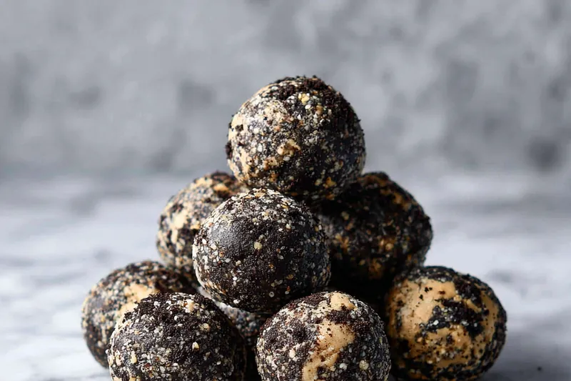 Preparing the Oreo protein balls mixture in a bowl