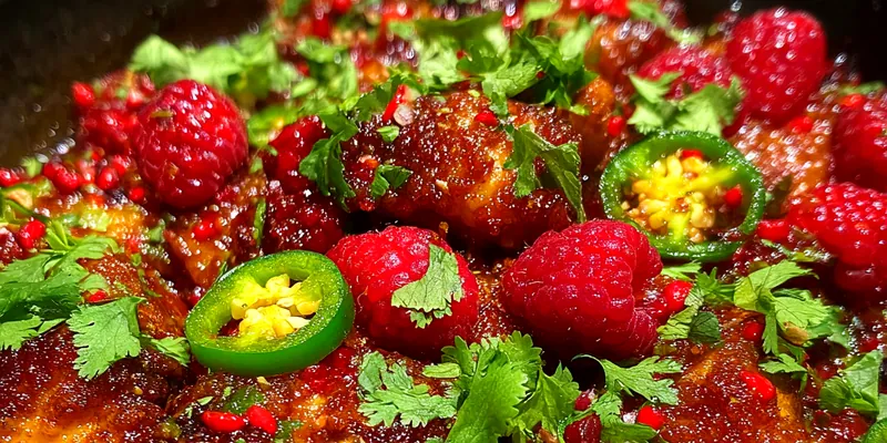 Delicious Spicy Raspberry Jalapeño Chicken served on a plate
