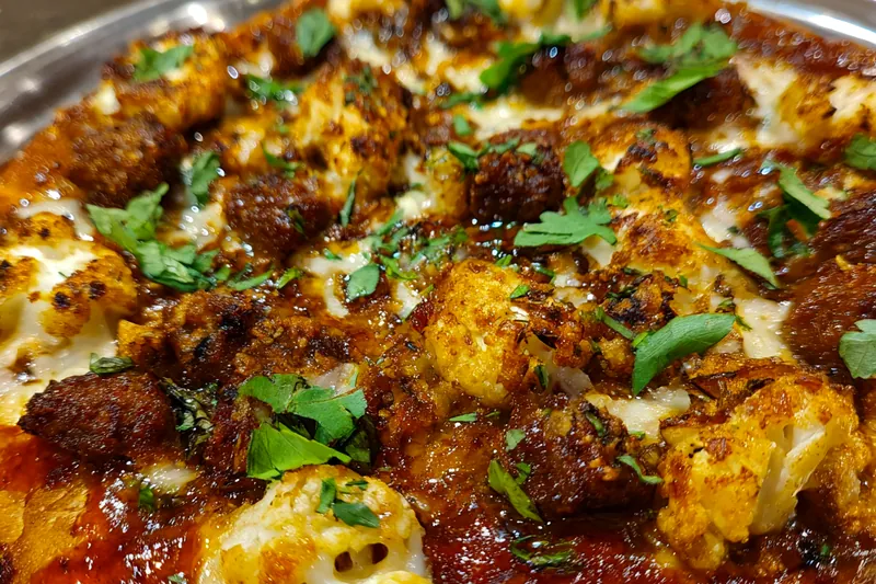 Fresh ingredients for Spicy Sausage Honey Pizza